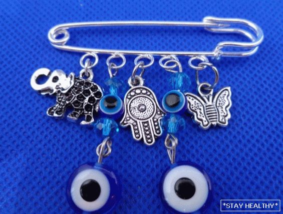 The evil eye pin: how to pin and wear charm