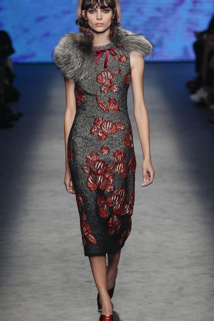 dress with asymmetry and a fur collar