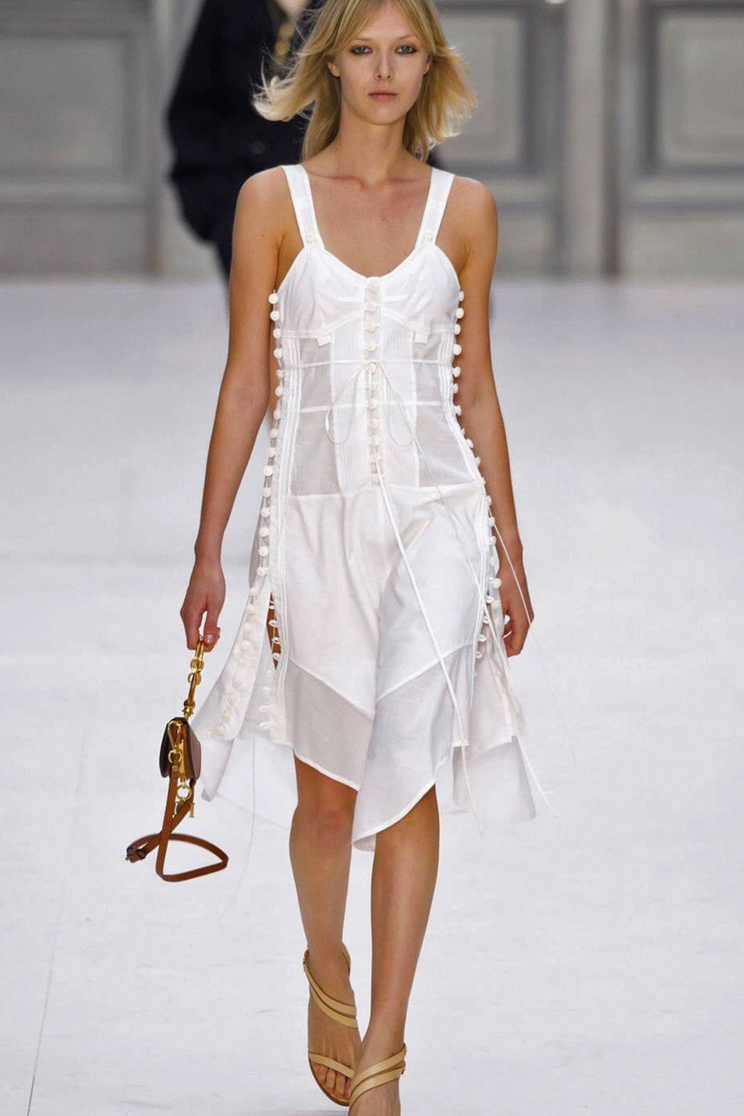 trendy white dress with an asymmetrical hem
