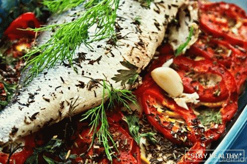 Sea bass baked on a vegetable cushion